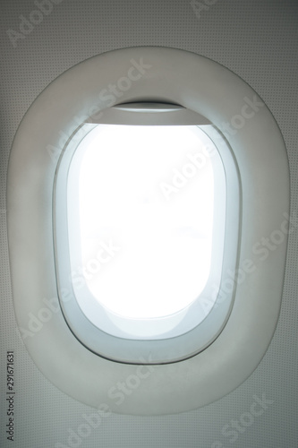Airplane window with white blank space for travel images. 