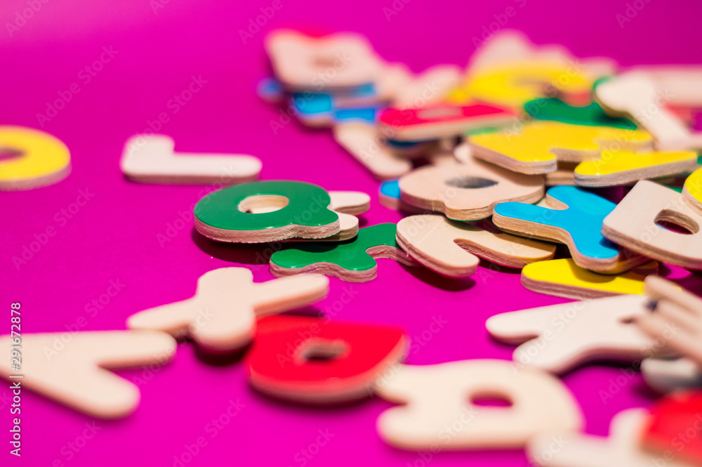 Photography of some wooden colored letters. Photography of some wooden colored letters.