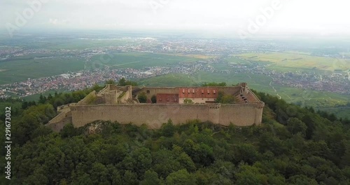 Retreating Aerial View of Hohlandsbourg Castle (Chateau du Hohlandsberg) and Rhine Valley in Alsace-Lorraine, France photo