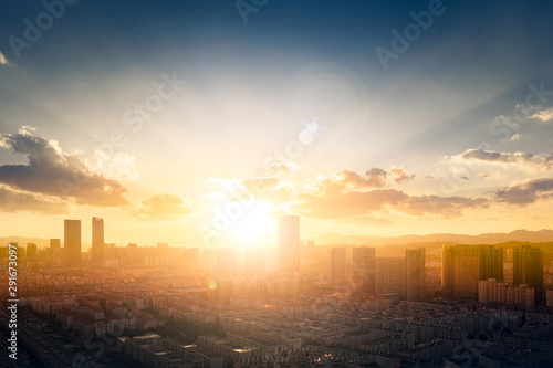 World Cities Day concept: Abstract city sunset background