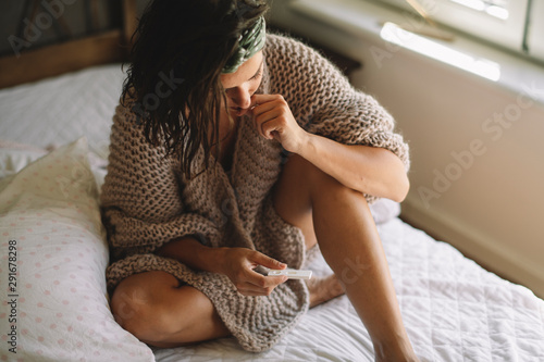 Sad woman after pregnancy test result