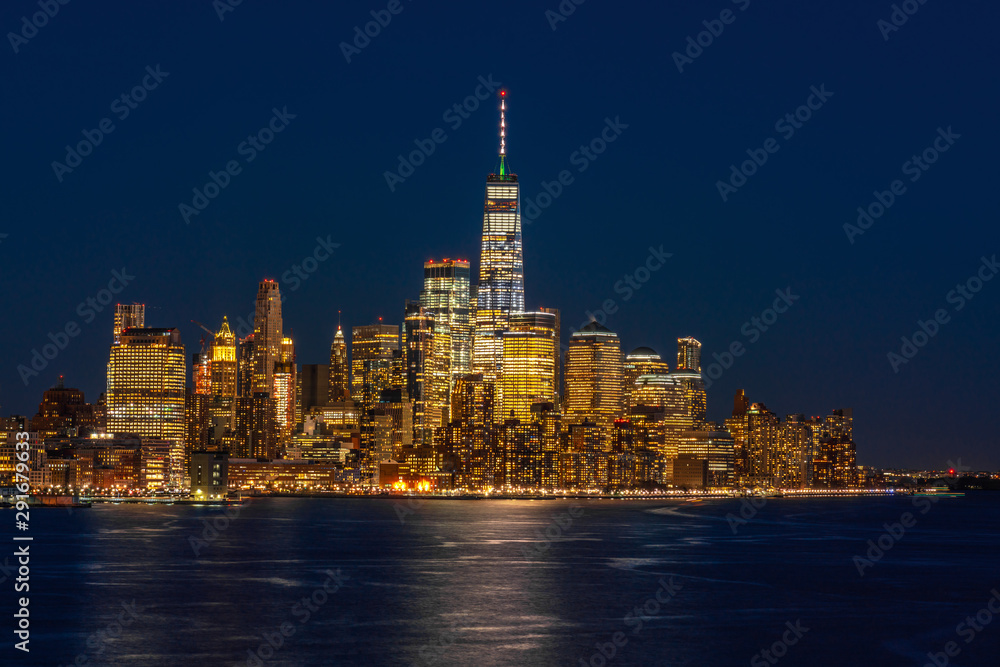 Lower Manhattan which is a apart of New york cityscape river side which can see One world trade center at twilight time, USA, Taking from New Jersey