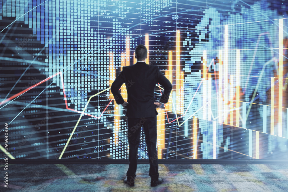 Businessman and forex graph and world map hologram. Double exposure. Concept of financial education and analysis Businessman and forex graph and world map hologram. Double exposure. Concept of financial education and analysis
