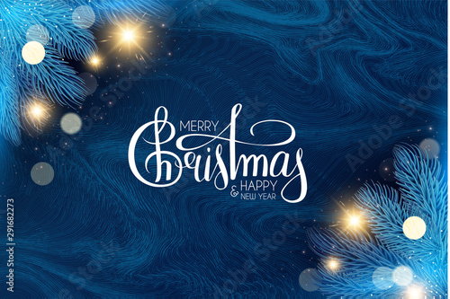 Merry Christmas and Happy New Year Holiday background with lettering, fir tree branches, bokeh effect, frost texture and lights.