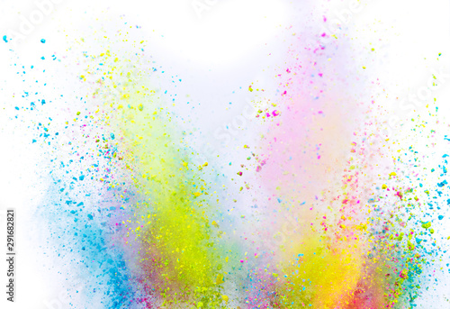 Colored powder explosion on white background. Freeze motion.
