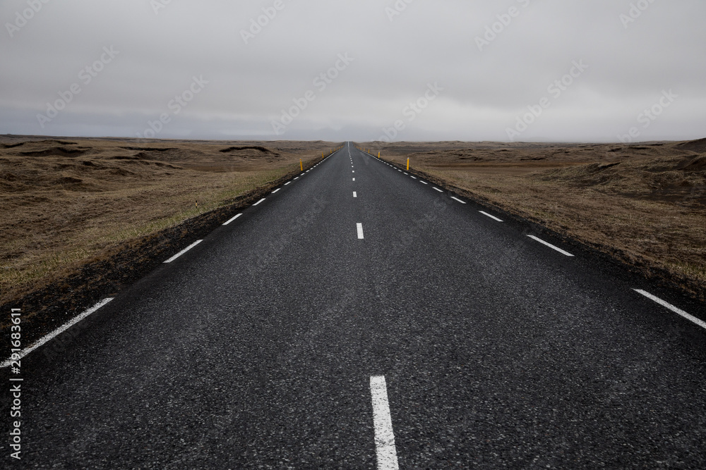 Travel to Iceland. Typical Icelandic landscape with Ring Road and scenic nature.