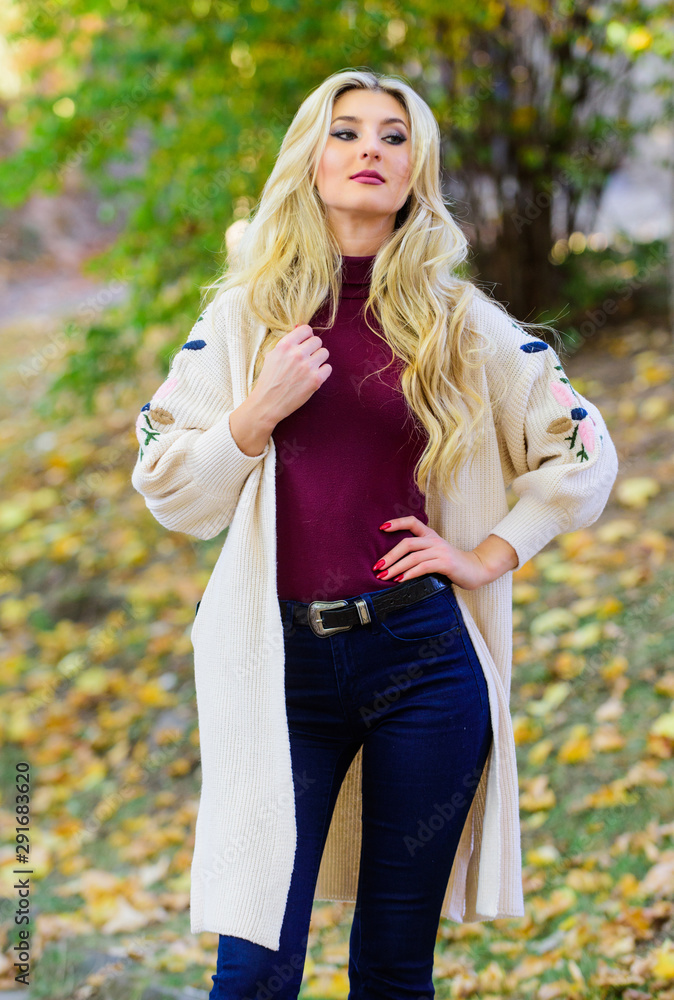 Woman wear long knitted cardigan while walk in park. Fall fashion cozy cardigan. Autumn fashionable cardigan. Girl stylish outfit with soft wool or cashmere cardigan. Feel so warm and comfortable Woman wear long knitted cardigan while walk in park. Fall fashion cozy cardigan. Autumn fashionable cardigan. Girl stylish outfit with soft wool or cashmere cardigan. Feel so warm and comfortable