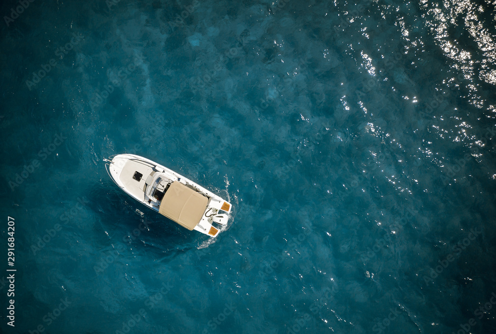 Fototapeta premium Speed boat in mediterranean sea, aerial view