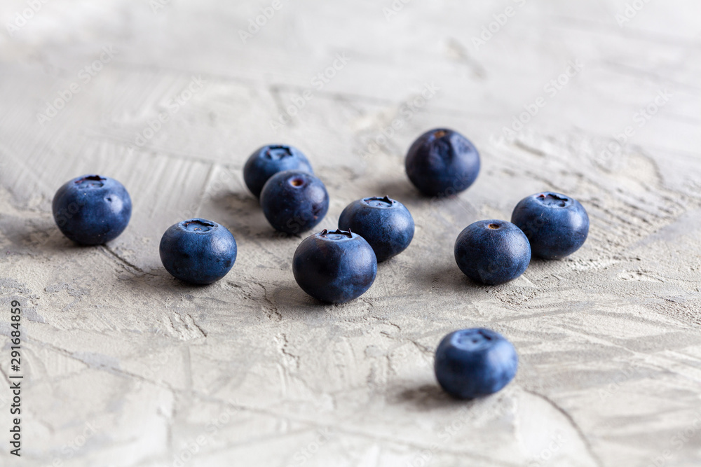 Blueberries on textured background with shallow focus Blueberries on textured background with shallow focus