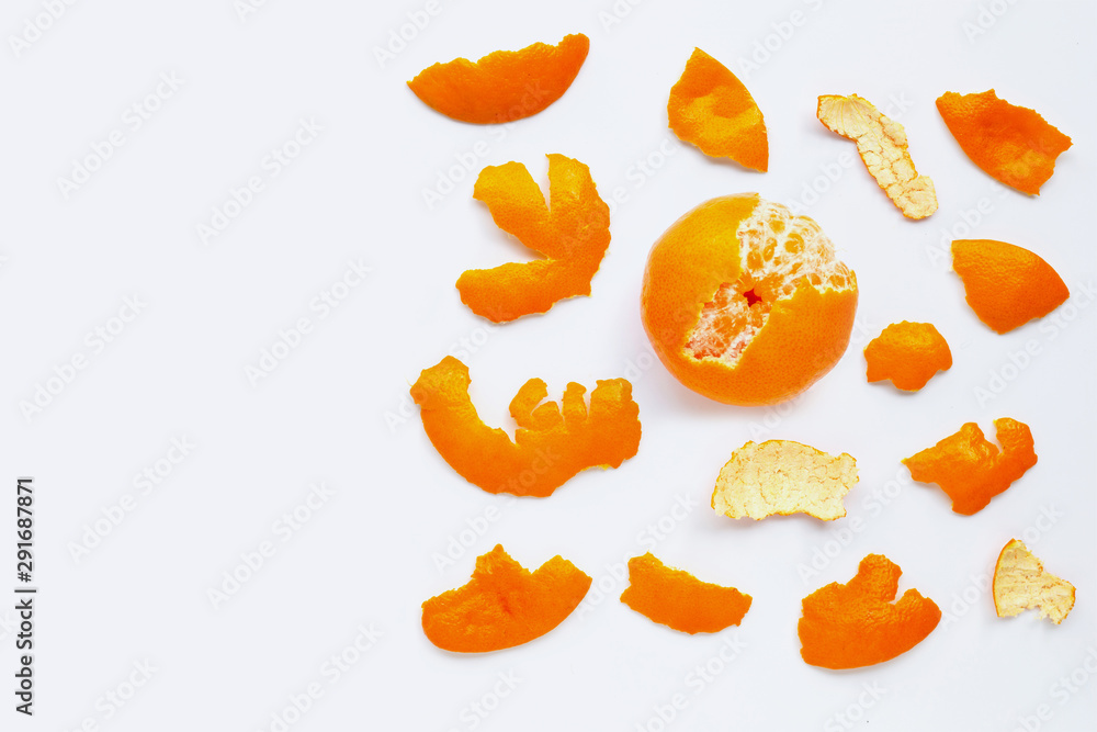 Orange with peel on white. Copy space Orange with peel on white. Copy space