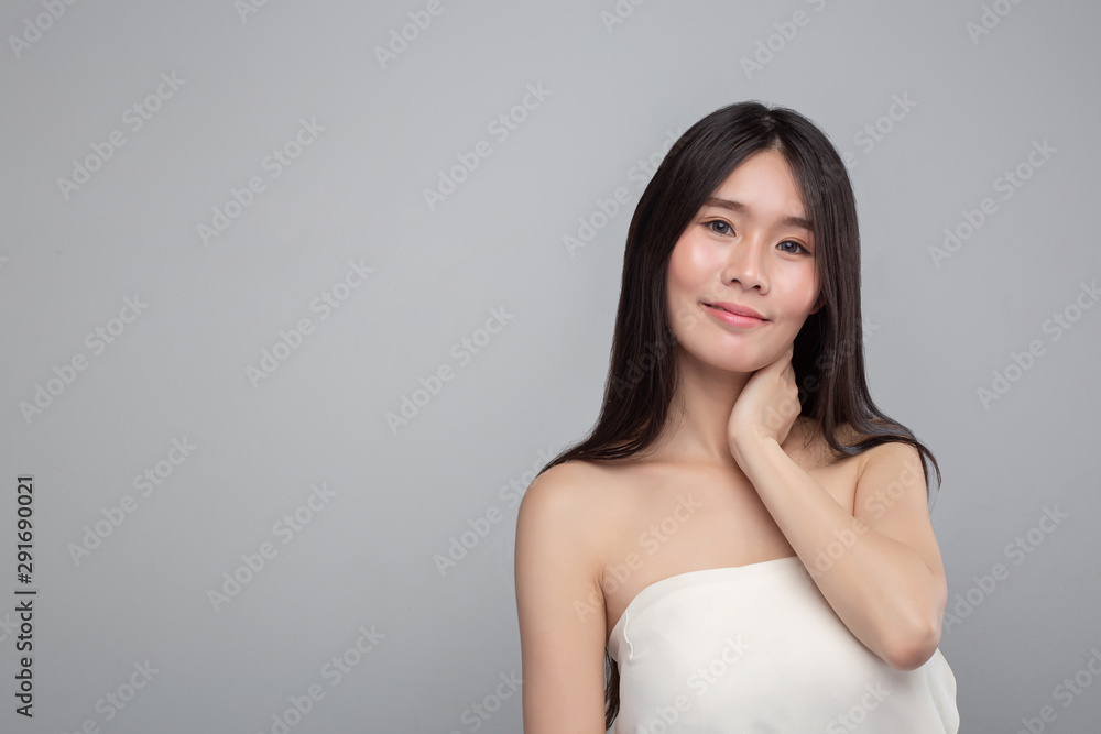 woman wearing a white strapless dress and hands touching the neck woman wearing a white strapless dress and hands touching the neck