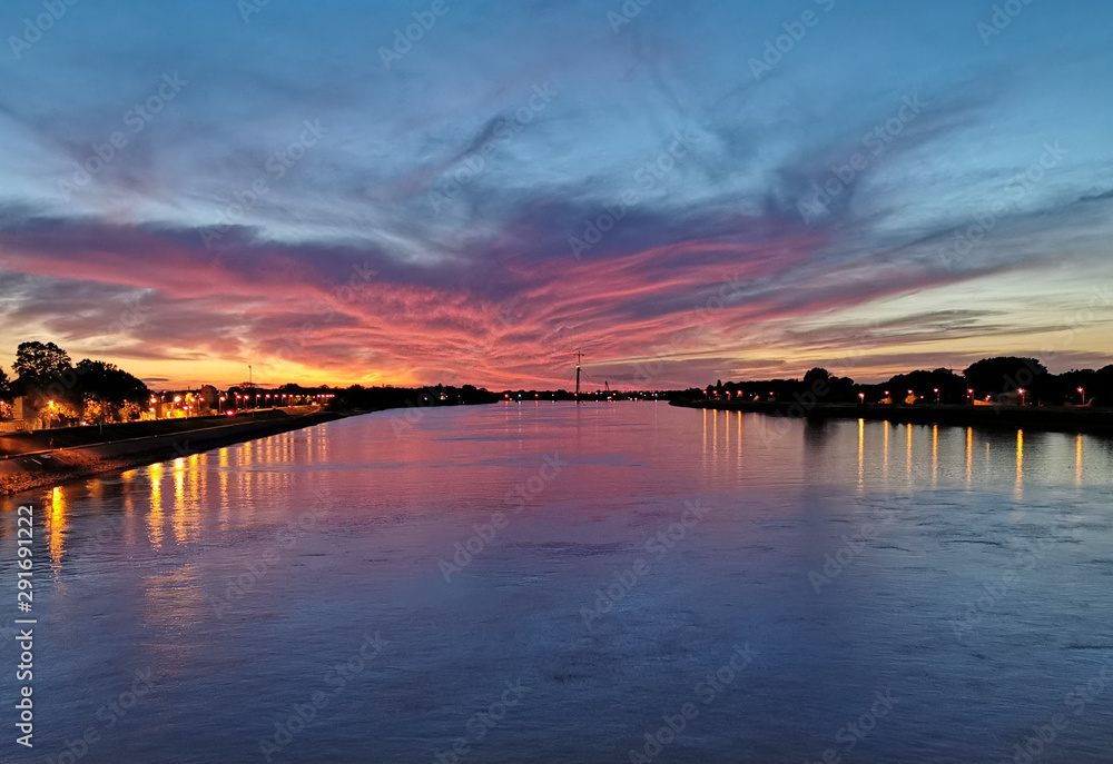 Danube river in colorful sunset at Komarom, Hungary