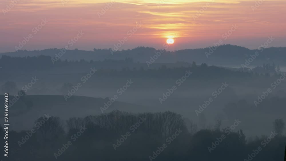 Magic morning sunrise over hills covered by fog in fall Magic morning sunrise over hills covered by fog in fall