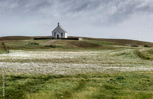 Photos Lone Stonybreck village church, on Fair Isle island in Shetland with floral mead