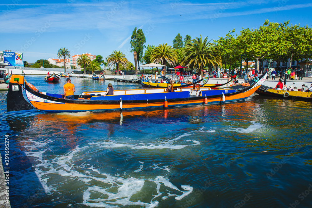 Gondolas for tourists on the channel of a portuguese city Gondolas for tourists on the channel of a portuguese city