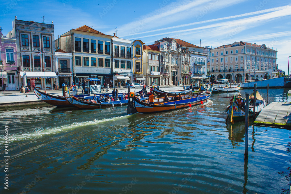 Gondolas for tourists on the channel of a portuguese city