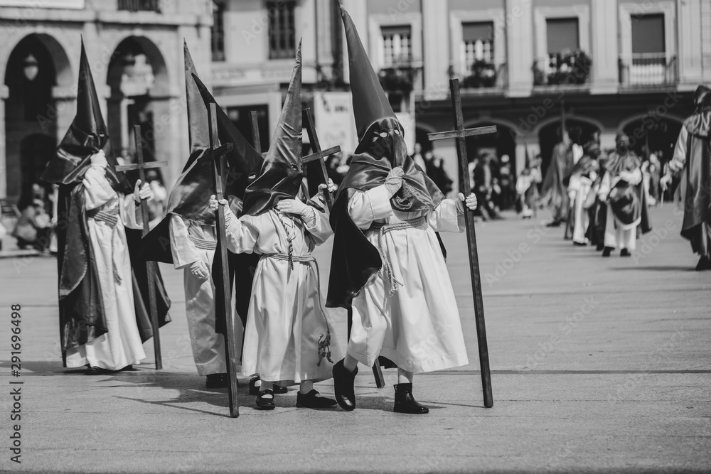 Hooded people in a procession, Holy Week