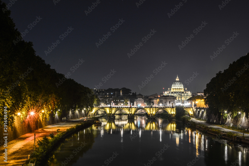 Castle St Angelo in Rome at night view from the bridge