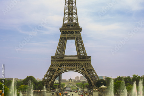 Eiffel Tower on blue cloudy sky