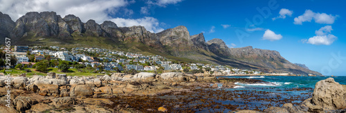 Camps Bay coast with the The Twelve Apostles mountains on the background.