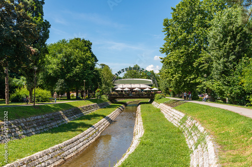 Loznica, Serbia - July 11, 2019: The river Štira in the center of Loznica. Intermezzo restaurant in the center of Loznica in Serbia.