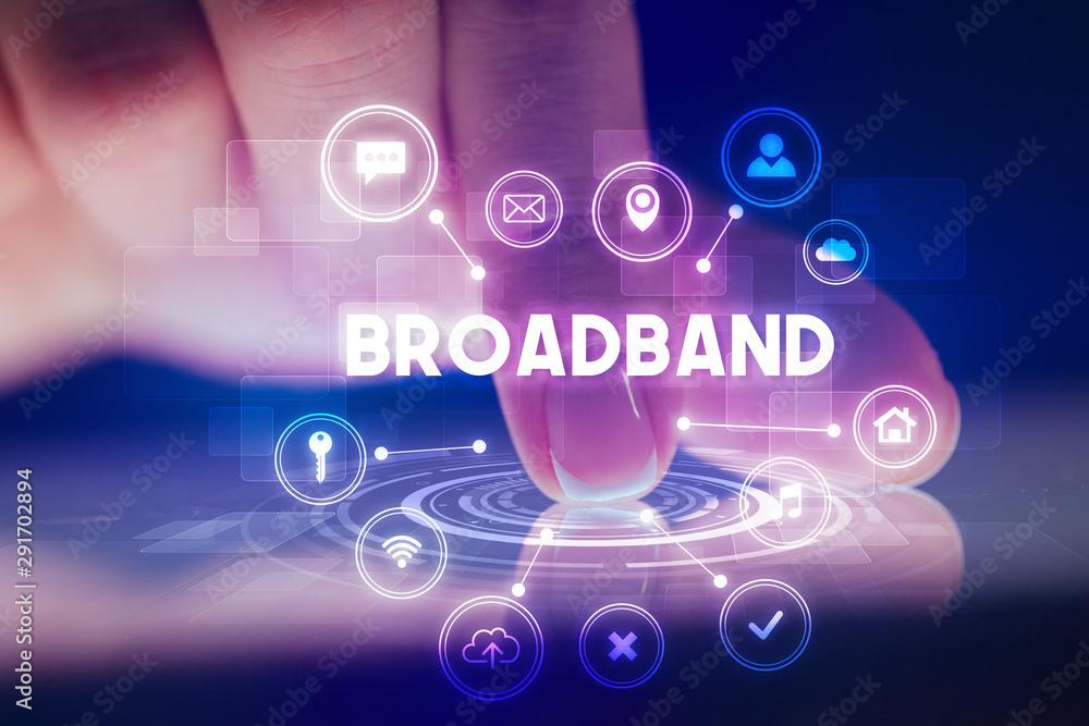 Finger touching tablet with web technology icons and BROADBAND inscription, web technology concept Finger touching tablet with web technology icons and BROADBAND inscription, web technology concept