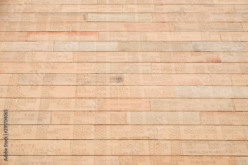 Photography Engraved name of the soldiers on the bricks of India Gate in Delhi, India