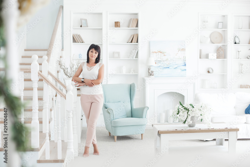 Adult woman interior portrait. Mature female indoors. Cheerful woman closeup portrait. Lady at home. Adult woman interior portrait. Mature female indoors. Cheerful woman closeup portrait. Lady at home.
