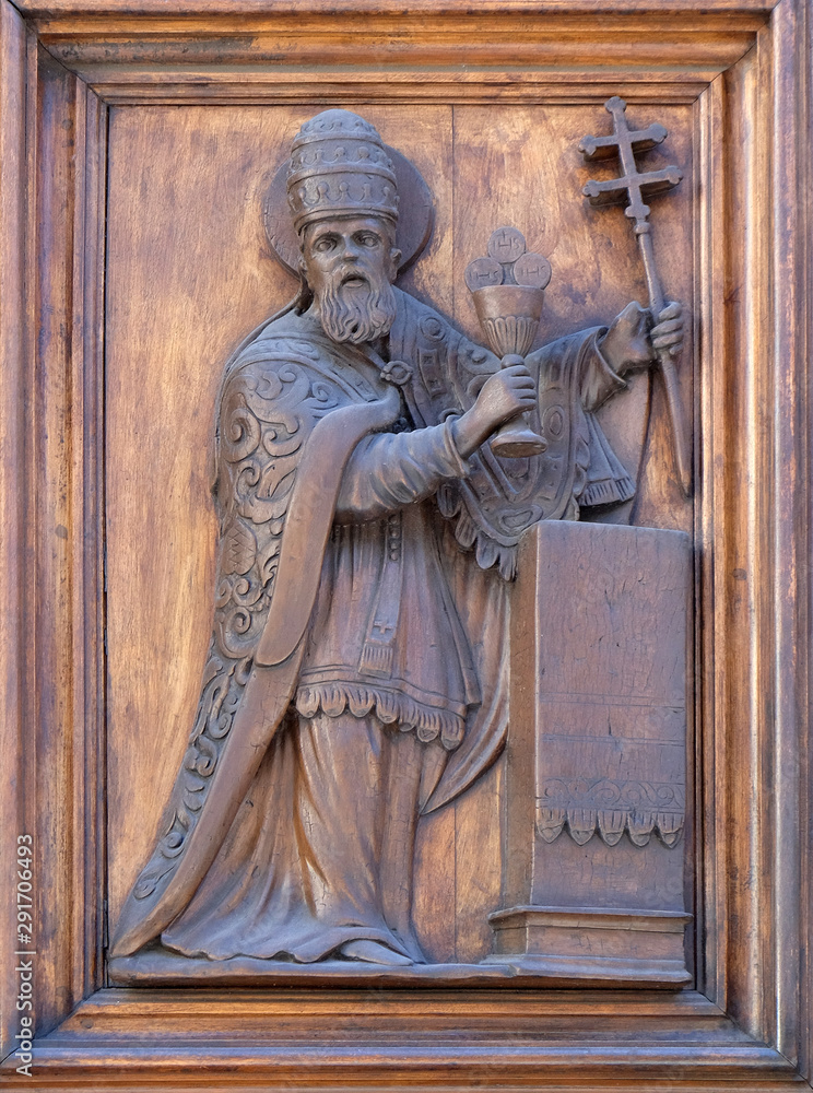 Saint, detail of te door of Church Santa Maria Maggiore in Florence, Tuscany, Italy Saint, detail of te door of Church Santa Maria Maggiore in Florence, Tuscany, Italy