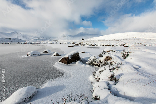 Scottish, Highland, Rannoch Moor, bright snow frozen river, winter day, sunshine, blue sky beautiful clouds © Samuel