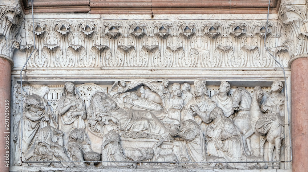 Annunciation, Nativity and Adoration of the Magi, lunette over the portal of Cathedral of St Martin in Lucca, Italy