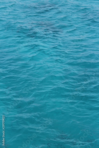 transparent pale blue azure water in the sea