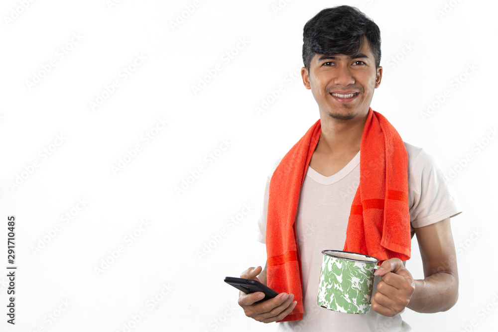handsome man wearing a white shirt with towel bring coffee and using phone isolated on white background. handsome man wearing a white shirt with towel bring coffee and using phone isolated on white background.