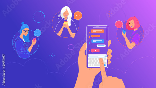 Human hand holds smart phone with messenger app and keyboard on screen