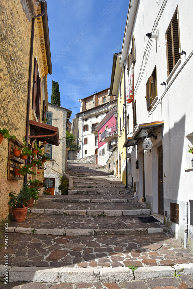 A road between the houses of an Italian mountain village