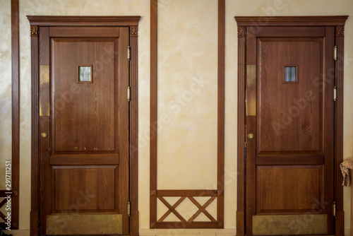 interior of a hotel or restaurant. Wooden door  large windows