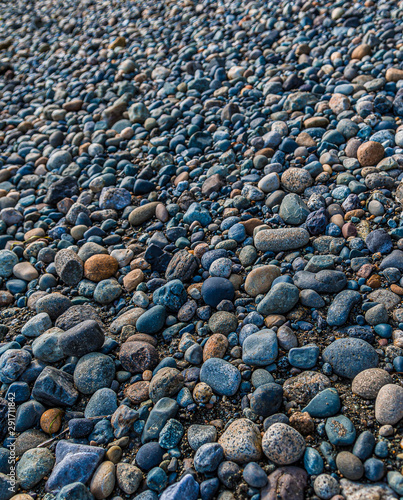 Many Colored Pebbles on a Beach at Low Tide