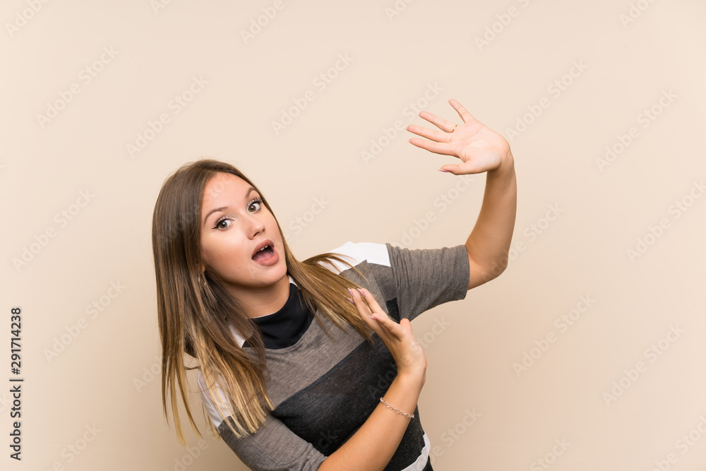 Teenager girl over isolated background nervous and scared Teenager girl over isolated background nervous and scared