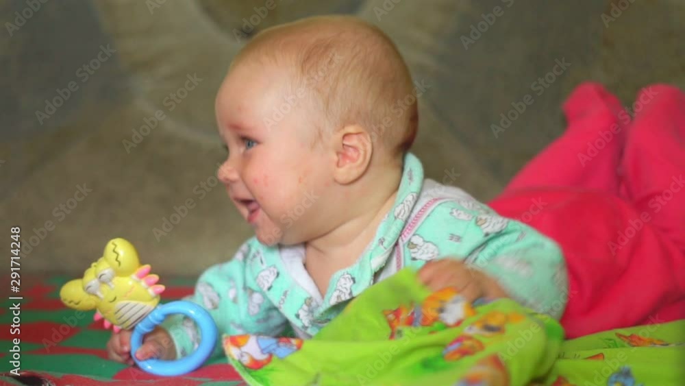 child playing on the bed child playing on the bed