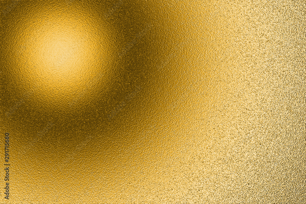 Gold background based on rough surface texture, with highlights and light transitions Gold background based on rough surface texture, with highlights and light transitions