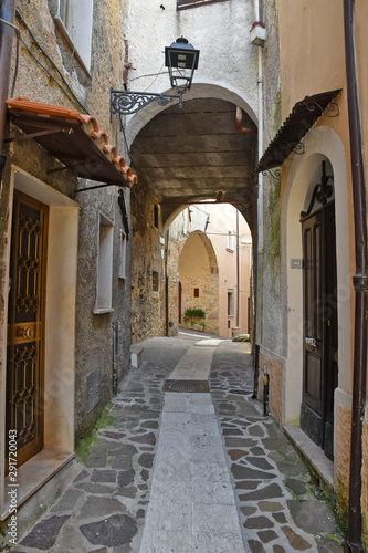 A street among the old houses of a medieval village © Giambattista