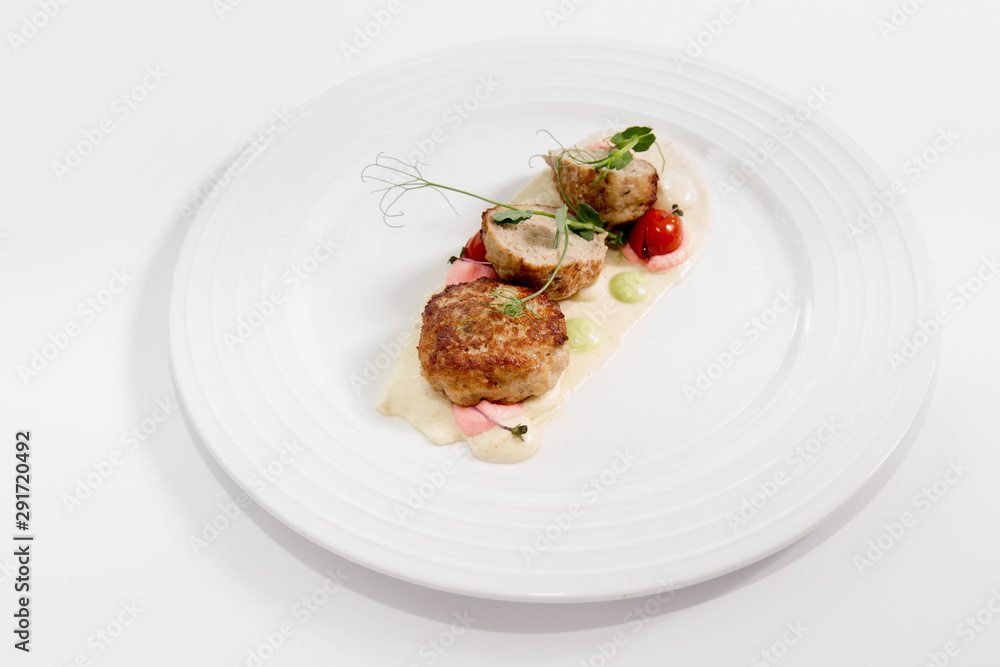 Meat balls with sauce on a white plate Meat balls with sauce on a white plate