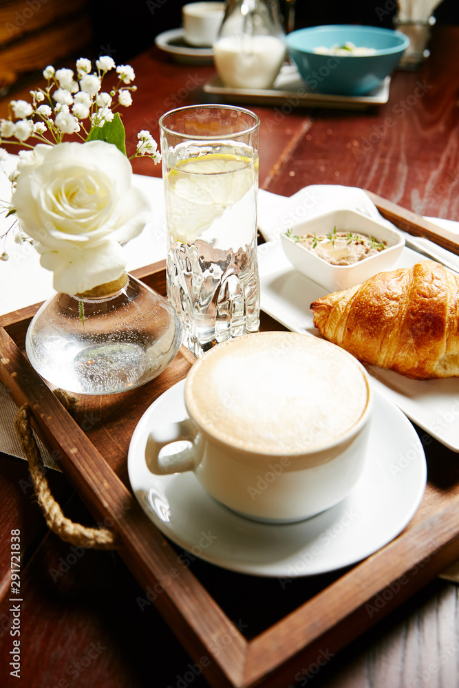 Breakfast croissant and coffee Breakfast croissant and coffee