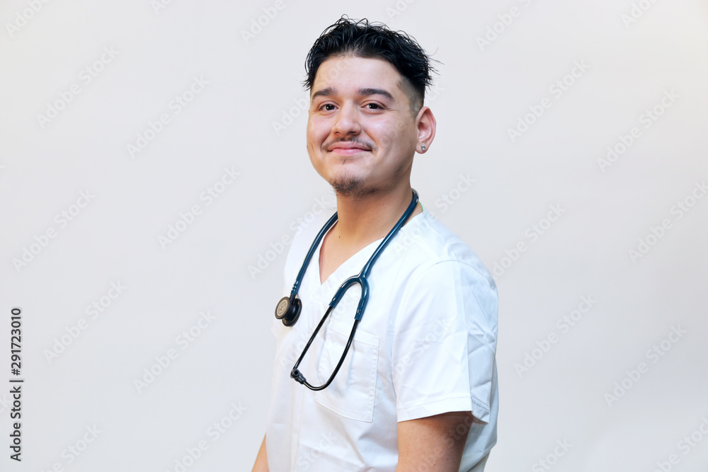 Portrait of a young hispanic male healthcare professional, portrait of a medical intern Portrait of a young hispanic male healthcare professional, portrait of a medical intern