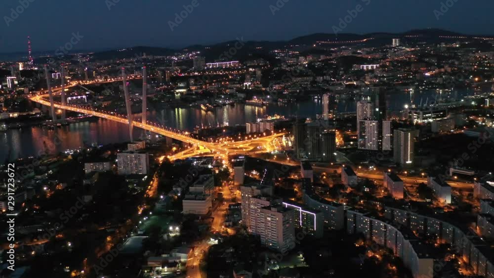 Vladivostok, Russia. Aerial view of the night landscape overlooking the Golden bridge. Vladivostok, Russia. Aerial view of the night landscape overlooking the Golden bridge.