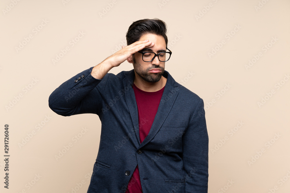 Handsome young man over isolated background with tired and sick expression Handsome young man over isolated background with tired and sick expression