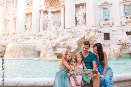 Photography Happy family near Fontana di Trevi with city map