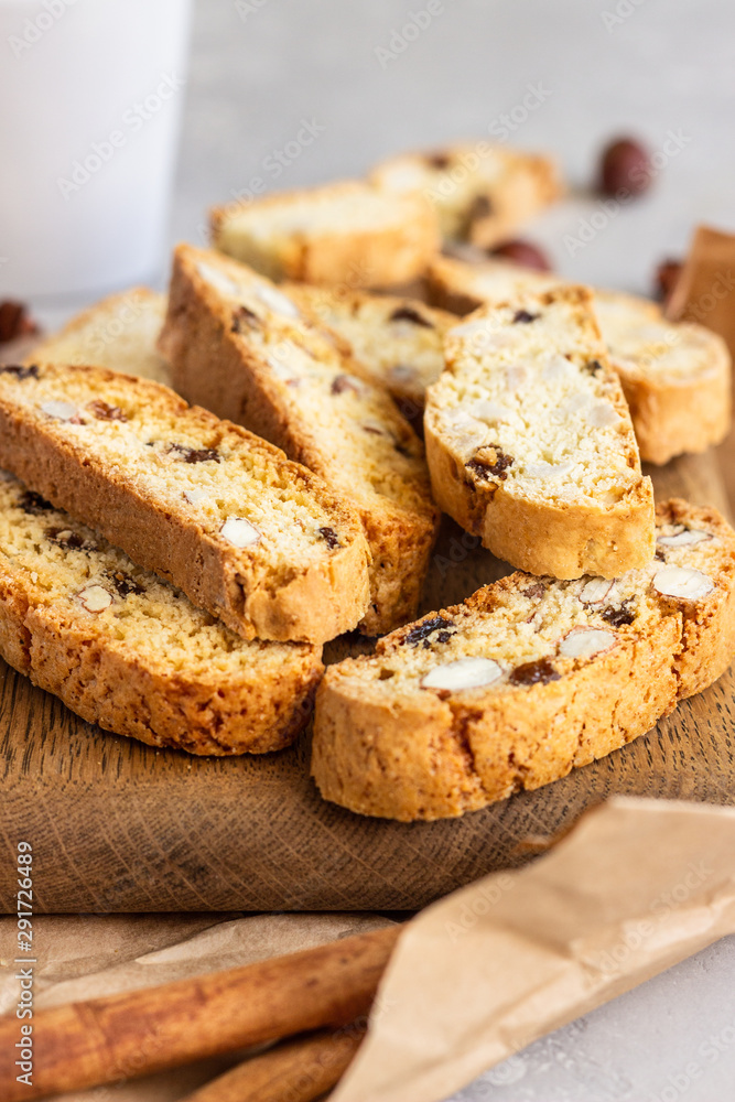 Italian homemade biscotti cookies or cantuccini with hazelnuts and a cup of coffee. Italian homemade biscotti cookies or cantuccini with hazelnuts and a cup of coffee.