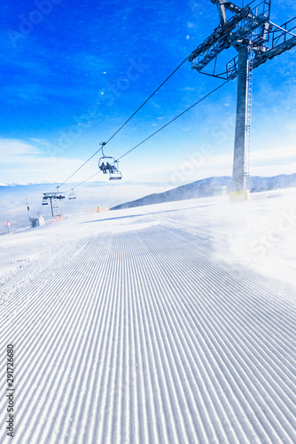 Chairlift for skiers on a rope