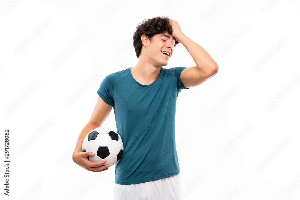 Young football player man over isolated white wall has realized something and intending the solution